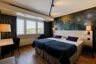 Copyright: : David Thunander Beds in Room Superior
